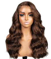 Mannequin head with brown wavy hair in a room setting
