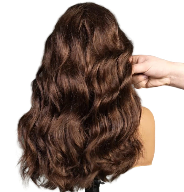 Mannequin head with brown hair in a salon setting